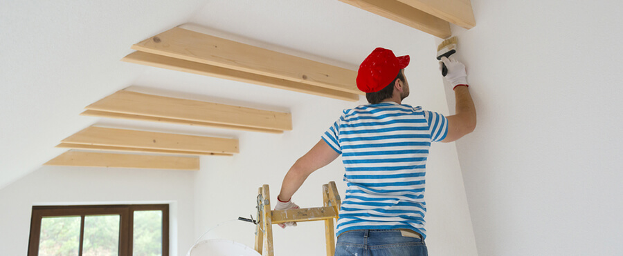 Man Painting Ceiling