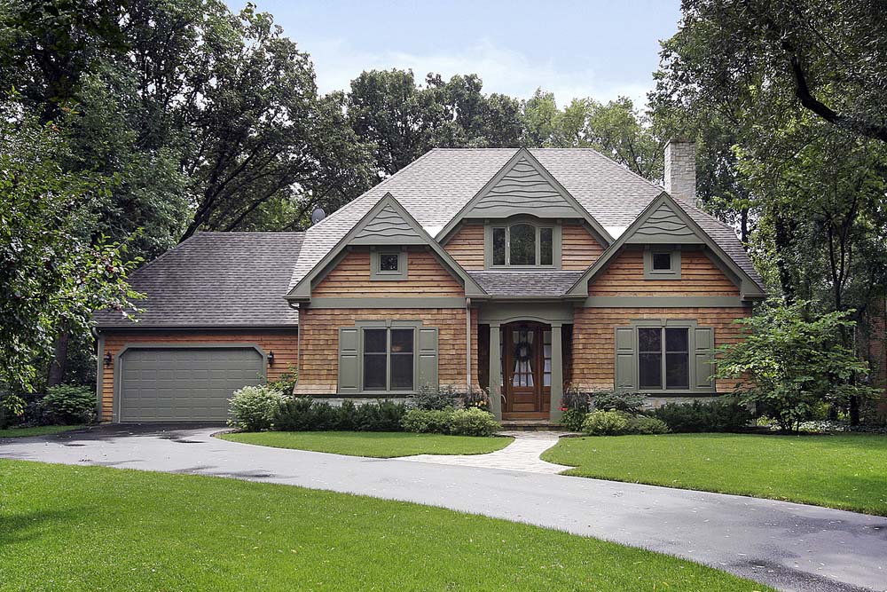 a suburban home with wood siding