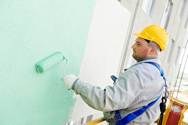 Man painting wall