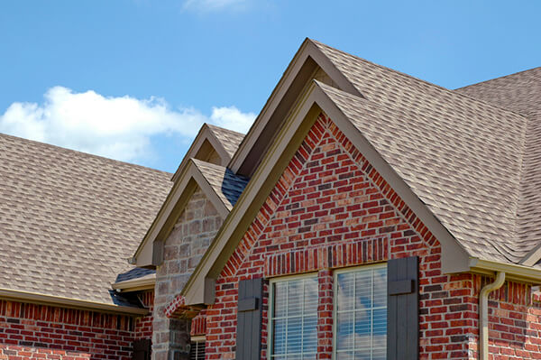 Shingles on brick home