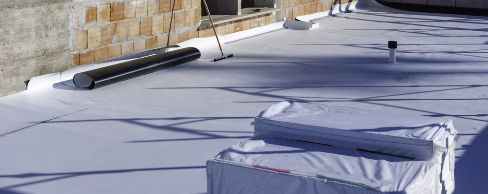 Thermoplastic polyolefin roofing on flat roof